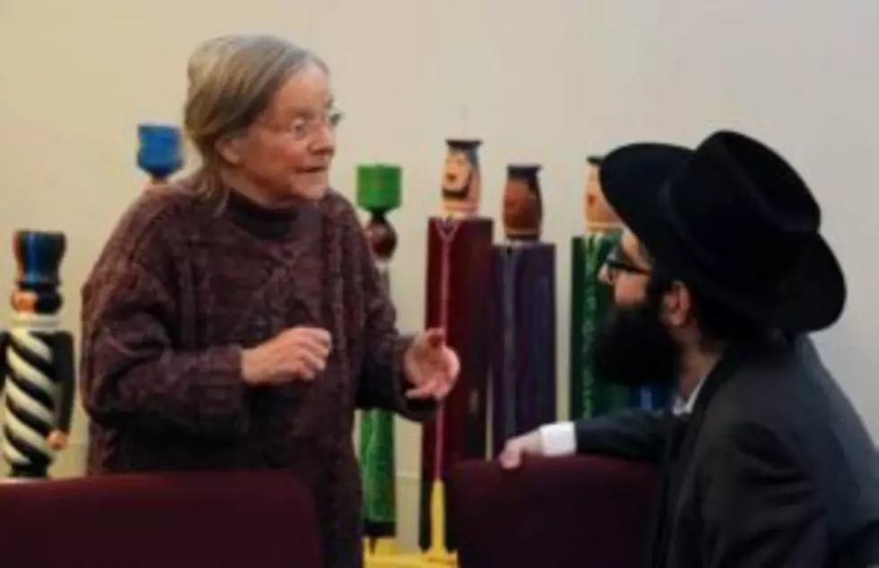 A woman talks to Rabbi Berry Nash in Missoula before Tuesday's interfaith and community gathering. (Martin Kidston/Missoula Current)