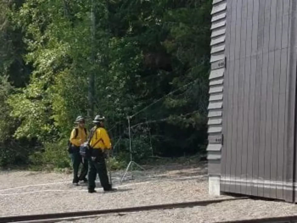 Crews are setting up sprinklers around buildings in the fire's path, including the boat house at the Fish Creek Campground. (inciweb.gov)