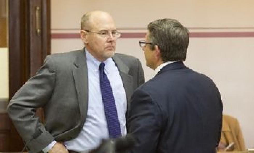 In the midst of his trial on charges of breaking campaign finance laws, Art Wittich, left, confers with his lawyer, Quentin Rhoades. (Kimberly Reed/Last Best News)