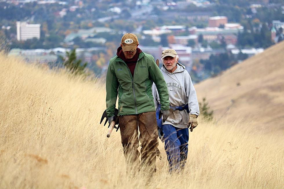 Despite rain, volunteers carve first trail across city&#8217;s new South Hills open space holding