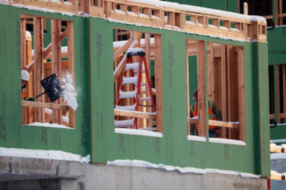Workers cleared snow from what will become a Marriott hotel in downtown Missoula. (Martin Kidston/Missoula Current)
