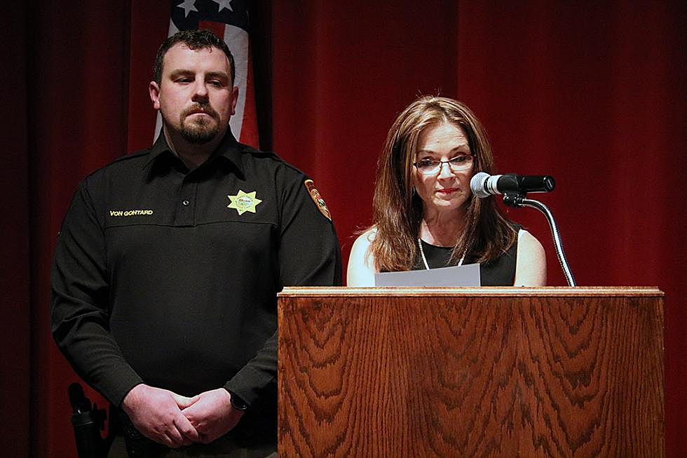 Maria Cole introduced four law enforcement and military personnel from Missoula and Ravalli counties during this week's forum at the University of Montana. (Martin Kidston/Missoula Current)