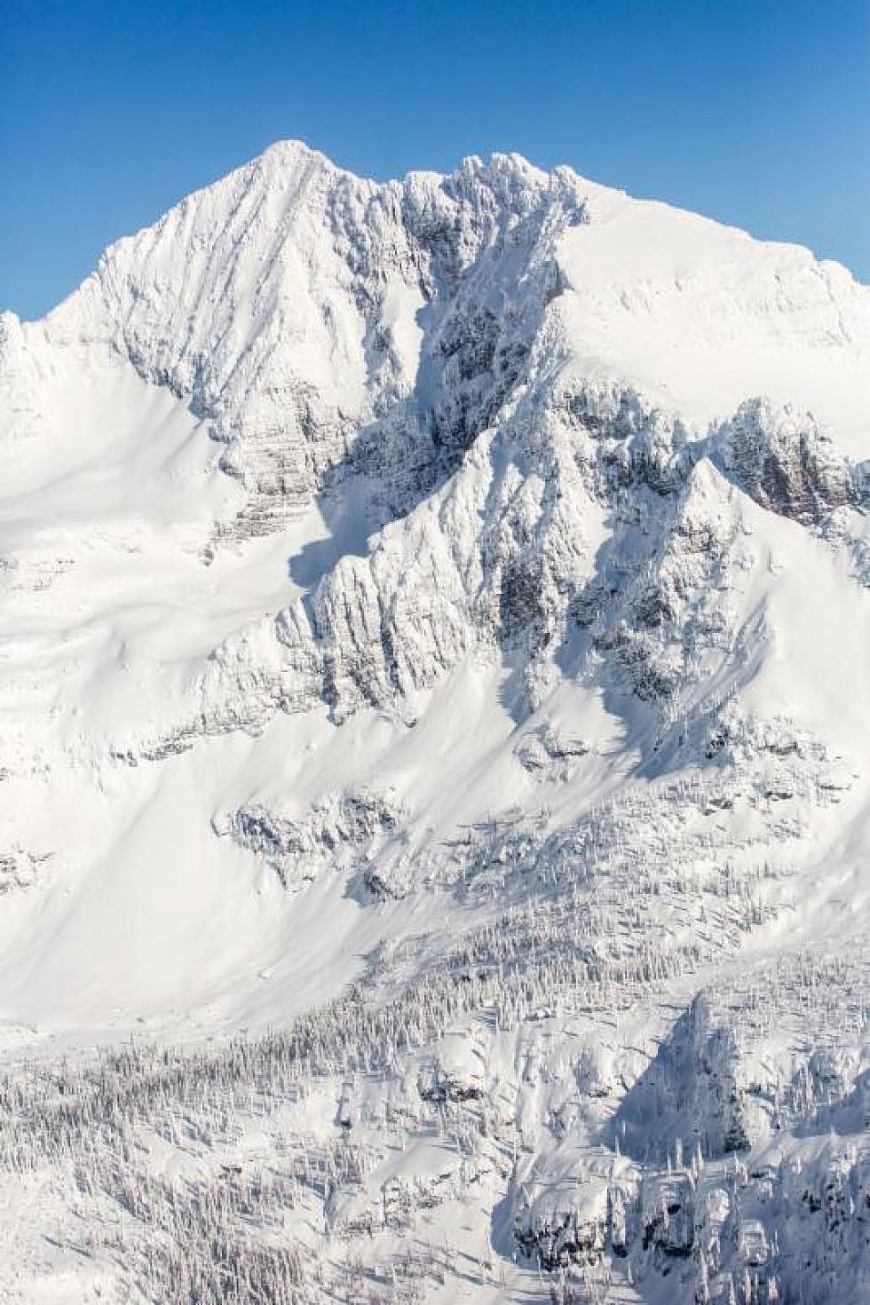 A fixed-wing aircraft flew over Sperry Chalet this week to inspect the structure four months after stabilization and in the midst of a record winter snowpack. (Gravityshots.com via Glacier National Park Conservancy)