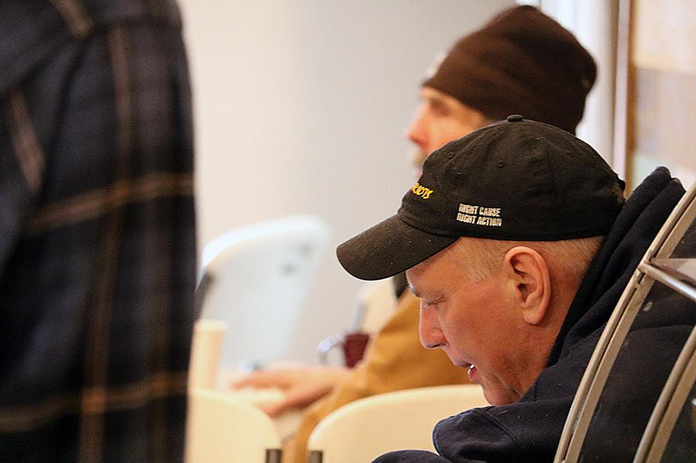 Visitors to the Union Gospel Mission's warming house on Toole Avenue get warn during a recent chilling morning. (Missoula Current)