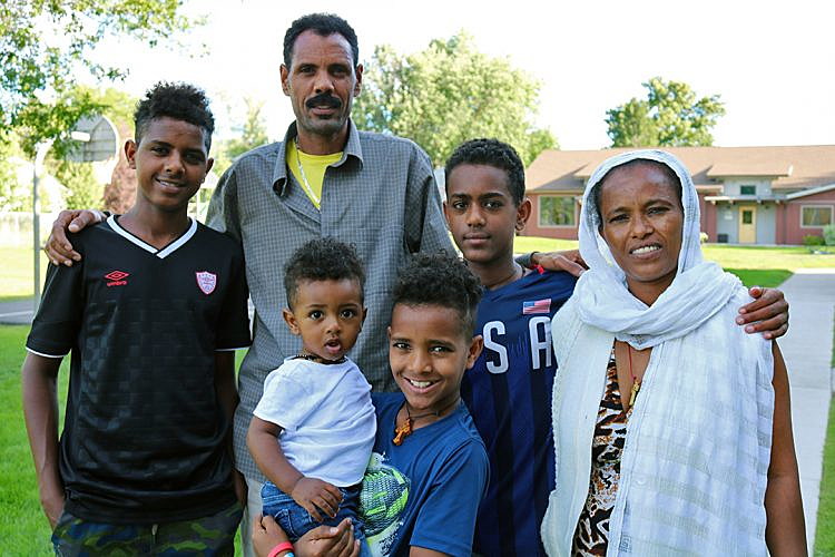 Settling in Eritrean refugees at home in Missoula; new son born a U.S